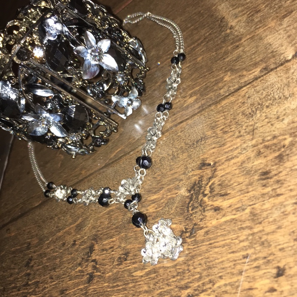 A set of a bracelet and necklace